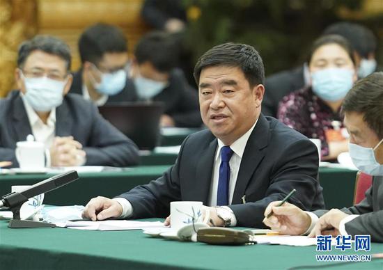 5月22日，全國人大代表薛志國參加內蒙古代表團的審議并發(fā)言。新華社記者 黃敬文 攝