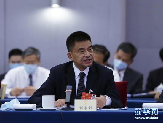  5月23日，全國政協(xié)委員劉永好在政協(xié)聯(lián)組會上發(fā)言。新華社記者 謝環(huán)馳 攝